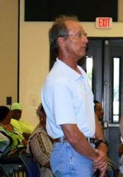 St. Croix resident William Tobias asks a question at the health insurance forum. St. Croix resident William Tobias asks a question at the health insurance forum.